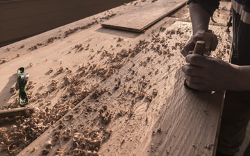 Structure of a handscrapped floorboard against the light